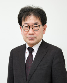 専務理事　小松 郁夫